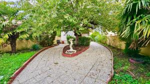 Chambre style hôtelière dans logement partagé, LExecutive Paris & Stade de France