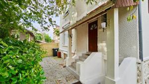 Chambre style hôtelière dans logement partagé, Le Pepsy Paris & Stade de France