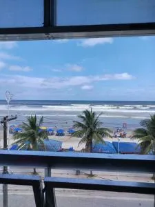 Apartamento pé na Areia com Garagem no Centro - 蒙加瓜