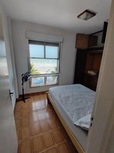 Apartamento pé na Areia com Garagem no Centro