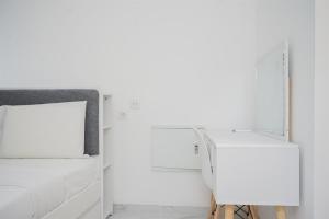 Comfy and Cozy Stay Studio Room at Sky House BSD Apartment By Travelio