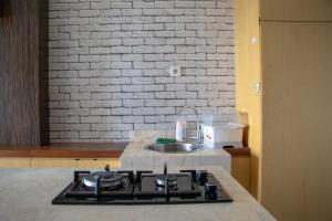 Comfort 2BR at Nifarro Park Apartment By Travelio