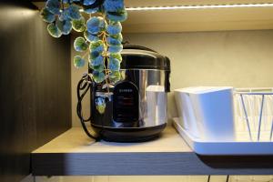 Simple and Comfort Studio Apartment at Nine Residence By Travelio