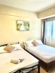 56sqm 2BR Condo at Mactan Newtown Pool and Beach Access!