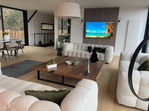 Maisons de vacances La Corniche, Villa d-architecte avec piscine, 2mn mer a Houlgate : photos des chambres