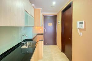 Nice Designed and Homey Studio at Menteng Park Apartment By Travelio