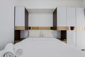 Warm and Nice 2BR Apartment at M-Town Residence By Travelio - Pumpangsineng