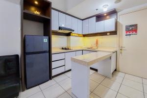Warm and Nice 2BR Apartment at M-Town Residence By Travelio