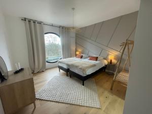 Maisons de vacances La Corniche, Villa d-architecte avec piscine, 2mn mer a Houlgate : photos des chambres