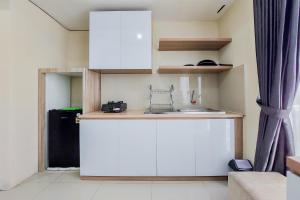Restful and Modern 2BR Majestic Point Serpong Apartment By Travelio