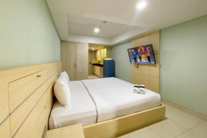 Cozy Studio Apartment at 21st Floor Warhol (WR) Residences By Travelio