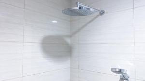 Fancy and Comfortable 1BR at Ciputra International Apartment By Travelio