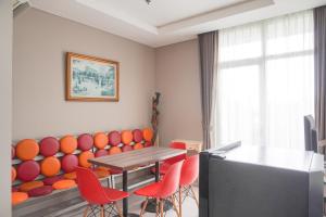 Fancy and Comfortable 1BR at Ciputra International Apartment By Travelio
