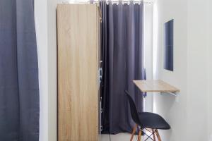 Homey and Elegant Studio Apartment M-Town Residence By Travelio