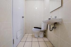 Homey and Elegant Studio Apartment M-Town Residence By Travelio