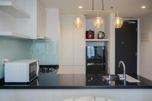 1BR Apartment with Comfortable Design at Branz BSD City By Travelio