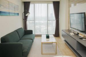 1BR Apartment with Comfortable Design at Branz BSD City By Travelio
