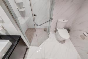 1BR Apartment with Comfortable Design at Branz BSD City By Travelio