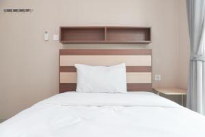 2BR Citralake Suites 2nd Floor Comfy Easy Access Apartment By Travelio