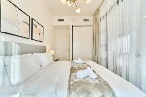 Stylish 2BR Apartment Steps from Dubai Hills Mall