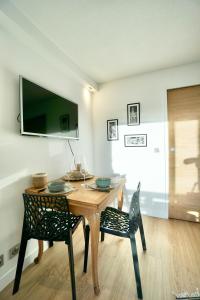 Appartements L-epicurien - Front de mer - : photos des chambres