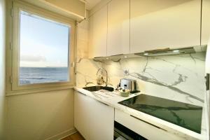 Appartements L-epicurien - Front de mer - : photos des chambres