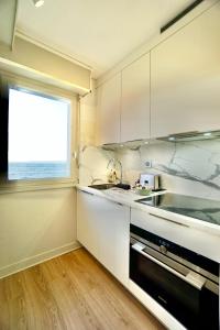 Appartements L-epicurien - Front de mer - : photos des chambres