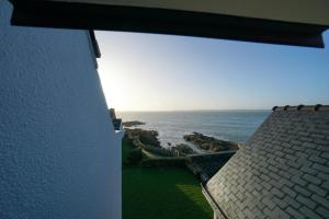 Appartements L-epicurien - Front de mer - : photos des chambres