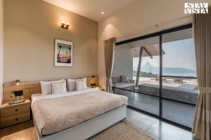 StayVista at Chitrakoot with Pool & Lawn
