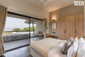 StayVista at Chitrakoot with Pool & Lawn