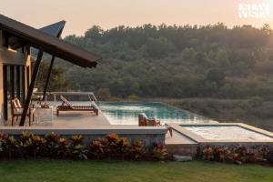 StayVista at Chitrakoot with Pool & Lawn