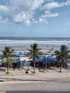 Apartamento pé na Areia com Garagem no Centro