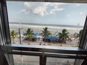 Apartamento pé na Areia com Garagem no Centro