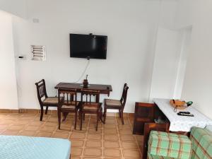 Apartamento pé na Areia com Garagem no Centro