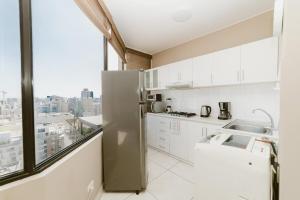 GRM1601 Modern 1 BDR with skyline views from Miraflores
