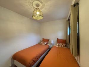 Appartements Charmant T3 lumineux & cosy : photos des chambres