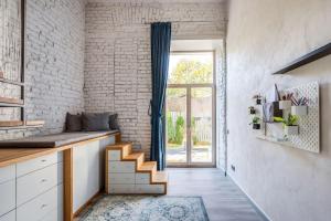 Old Brewery Loft in Paupys by Urban Rent