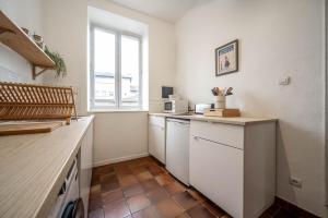 Appartements L-appartement Cosy : photos des chambres