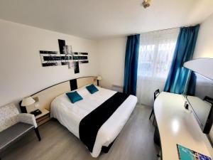 Hotels Citotel Hotel Le Capricorne : photos des chambres