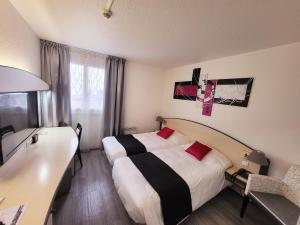 Hotels Citotel Hotel Le Capricorne : Chambre Lits Jumeaux