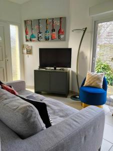 Maison avec jardin, calme et ensoleillée à 2 minutes du centre-ville