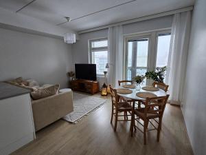 Stylish top floor ap, with private parking, next to a tram stop