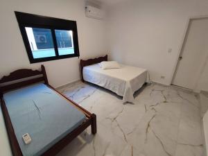 Casa Jardim Acapulco - Guarujá