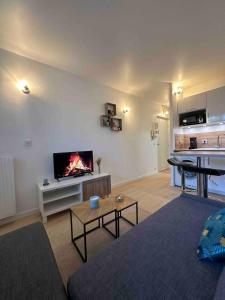 Appartements Studio neuf tout equipe - Calme - Proche centre ville - Parking gratuit : photos des chambres