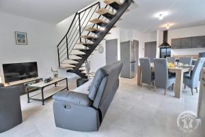 Maisons de vacances La grange du petit kernon : photos des chambres