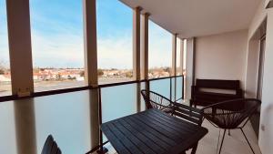 Appartements Le Lumina du centre bourg : photos des chambres