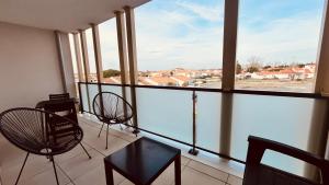 Appartements Le Lumina du centre bourg : photos des chambres