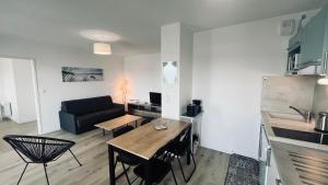 Appartements Le Lumina du centre bourg : photos des chambres