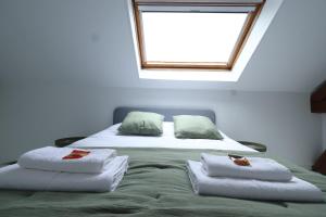Appartements E Le clos des lumieres, maison 13 pers avec jardin : photos des chambres