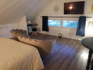 Appartements Au Coeur de la Vannerie : photos des chambres